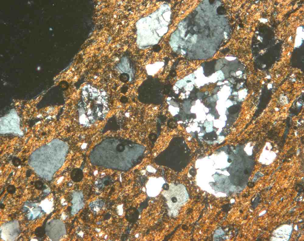 Plate 168.1: Photomicrograph of ROS BB 1 (XPL) (width of field 1.74 mm)